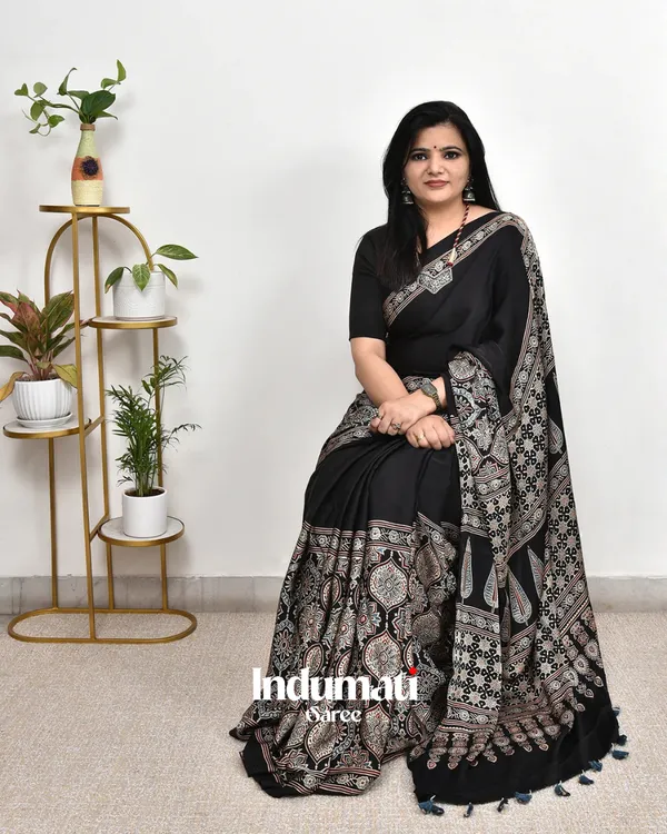 Black_Ajrakh_Printed_Modal_Silk_Premium_Plain_Saree_with_Fancy_Pallu_and_Blouse_Piece