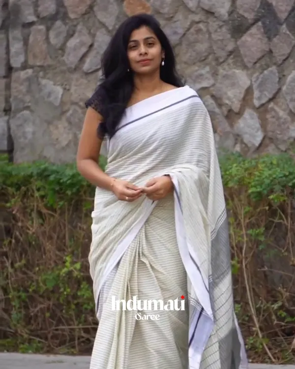 Divya_Rekha_-_White_Linen_Saree_with_Lining_Stripe_&_Pallu_Lining_Design_with_Blouse_Piece