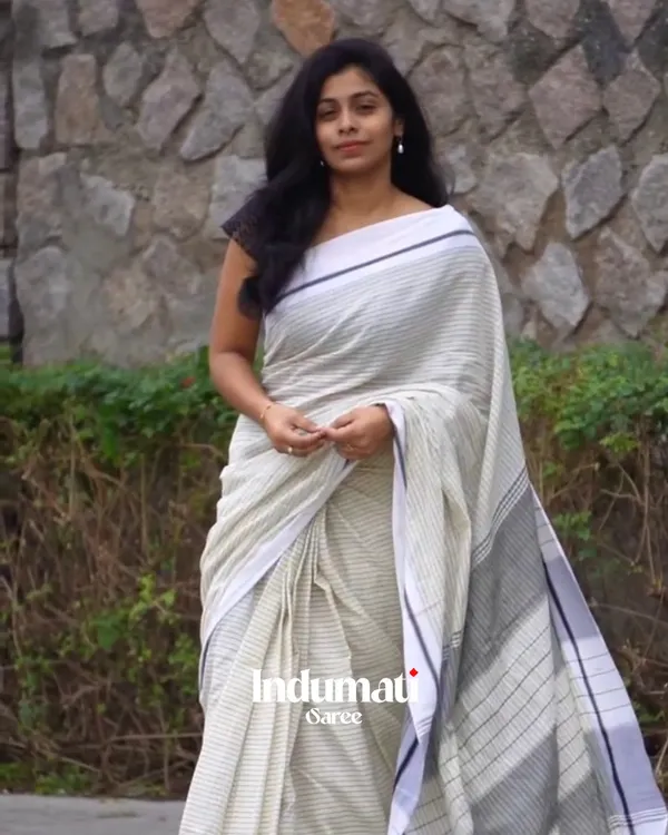 Divya_Rekha_-_White_Linen_Saree_with_Lining_Stripe_&_Pallu_Lining_Design_with_Blouse_Piece