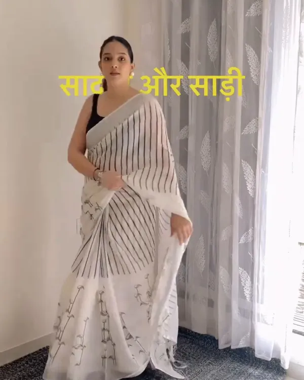 Hamsini_-_Graceful_White_Linen_Saree_with_Black_Border_Design_&_Blouse_Piece