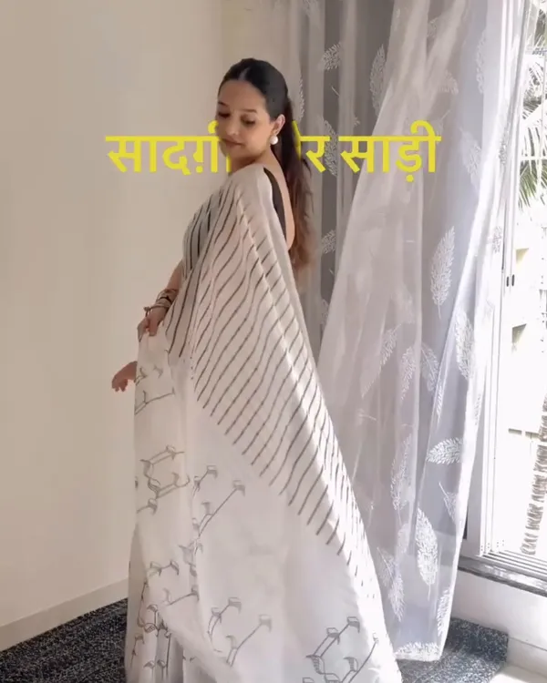 Hamsini_-_Graceful_White_Linen_Saree_with_Black_Border_Design_&_Blouse_Piece