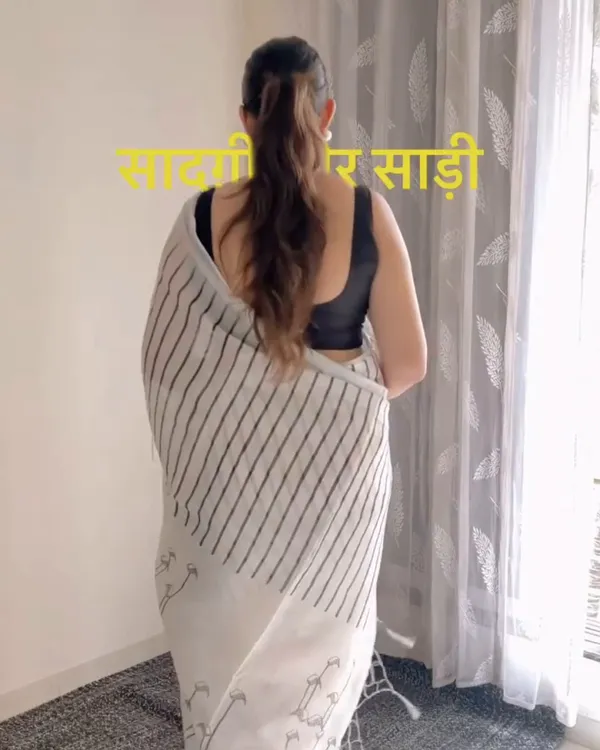 Hamsini_-_Graceful_White_Linen_Saree_with_Black_Border_Design_&_Blouse_Piece