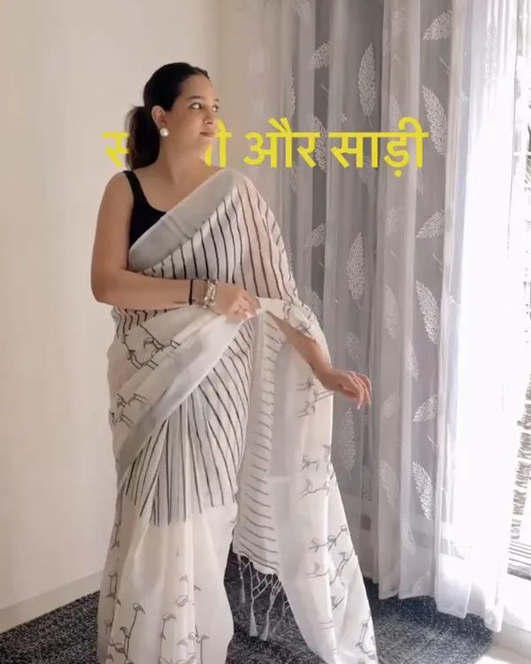 Hamsini_-_Graceful_White_Linen_Saree_with_Black_Border_Design_&_Blouse_Piece