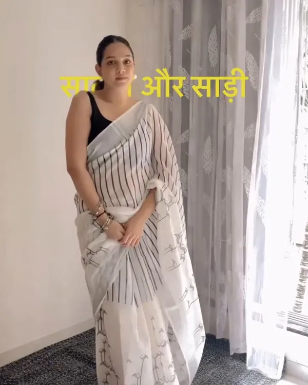 Hamsini_-_Graceful_White_Linen_Saree_with_Black_Border_Design_&_Blouse_Piece