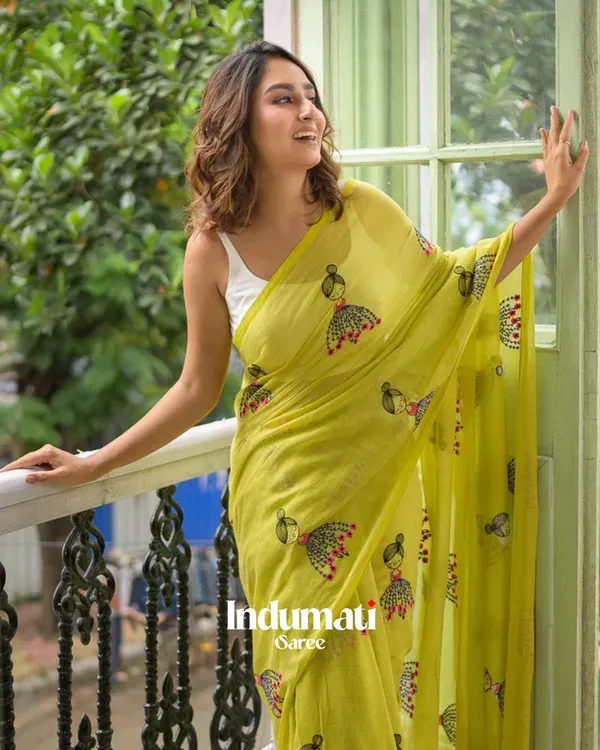 Yellow_Mulmul_Cotton_Saree_with_Cute_Embroidery_Motifs_&_Tassels,_with_Blouse_Piece
