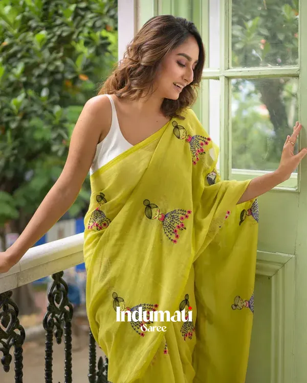 Yellow_Mulmul_Cotton_Saree_with_Cute_Embroidery_Motifs_&_Tassels,_with_Blouse_Piece