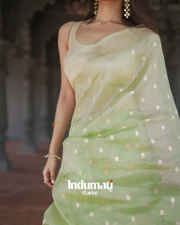 Green_Color_Premium_Cotton_Silk_Saree_With_Classy_Blouse_and_tassels
