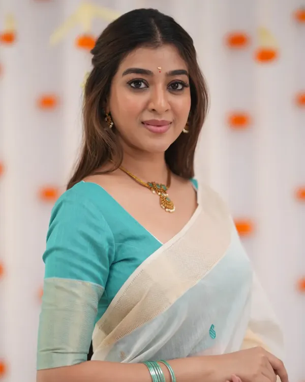 White_Color_Recent_Drop_Soft_Banarasi_Silk_Saree_with_Classy_Bottle_Blue_colorBlouse_Piece