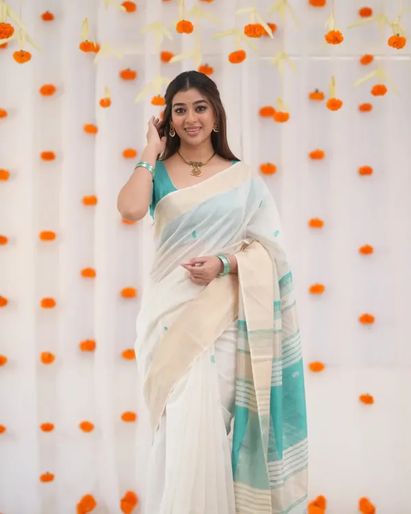 White_Color_Recent_Drop_Soft_Banarasi_Silk_Saree_with_Classy_Bottle_Blue_colorBlouse_Piece