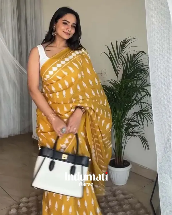 Haldi_Hues_-_Yellow_Saree_with_White_Contrast_Blouse_Piece