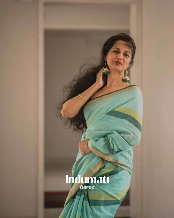Hari_Preet_-_Elegant_Bottle_Green_Saree_with_Yellow_Lining_&_Border_Detailing_with_Blouse_Piece