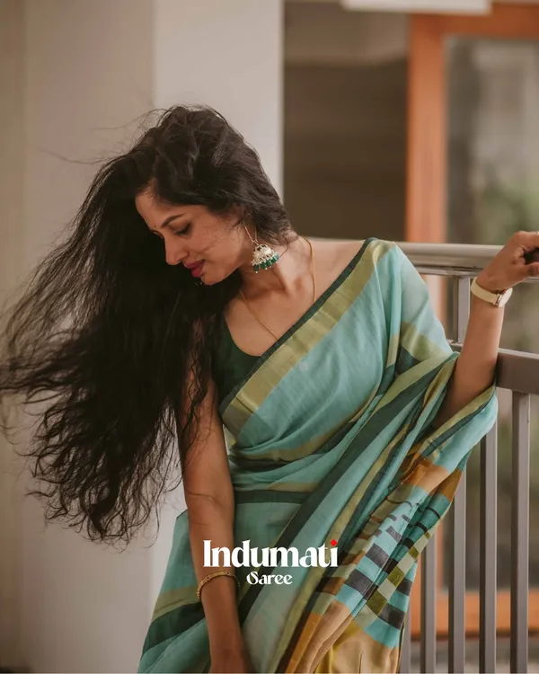 Hari_Preet_-_Elegant_Bottle_Green_Saree_with_Yellow_Lining_&_Border_Detailing_with_Blouse_Piece