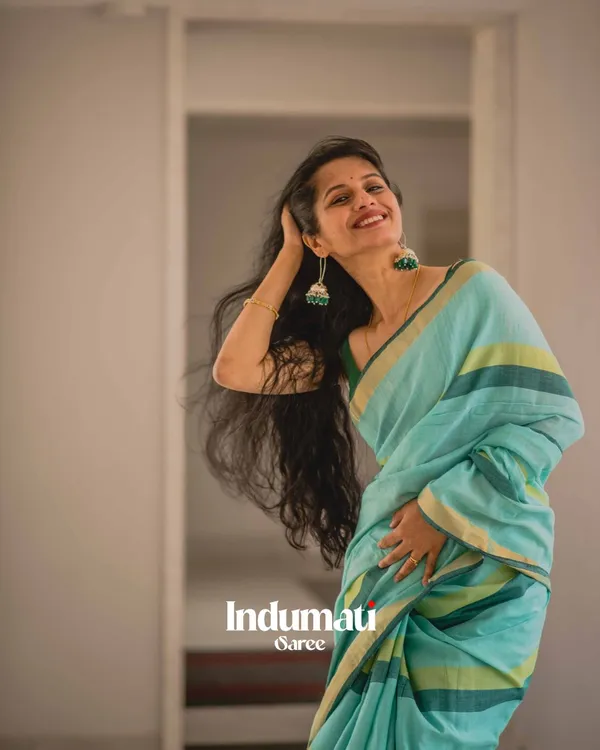 Hari_Preet_-_Elegant_Bottle_Green_Saree_with_Yellow_Lining_&_Border_Detailing_with_Blouse_Piece