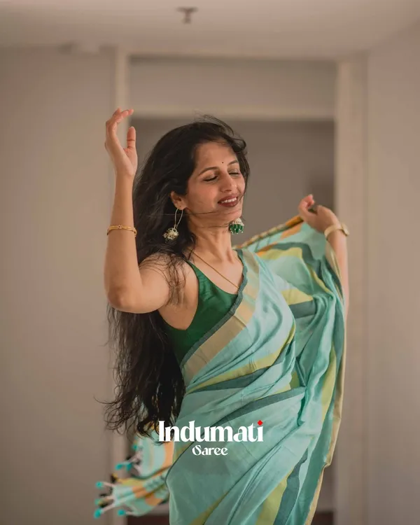 Hari_Preet_-_Elegant_Bottle_Green_Saree_with_Yellow_Lining_&_Border_Detailing_with_Blouse_Piece