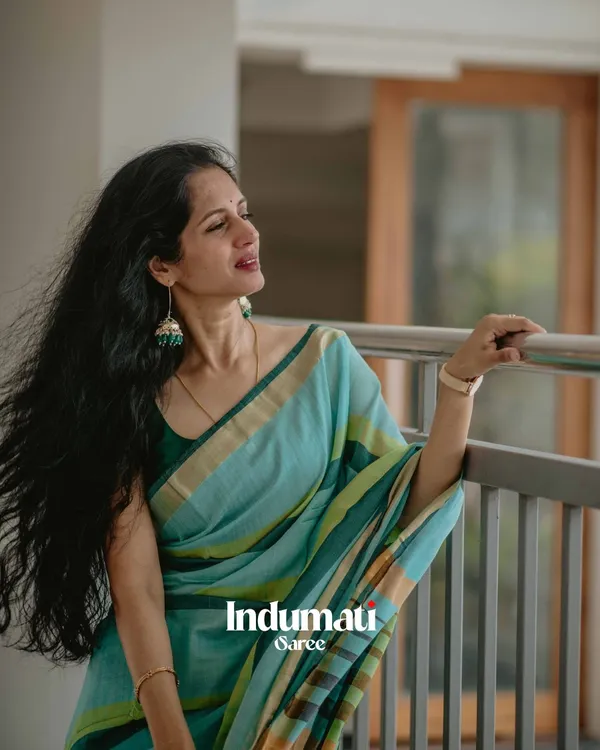 Hari_Preet_-_Elegant_Bottle_Green_Saree_with_Yellow_Lining_&_Border_Detailing_with_Blouse_Piece