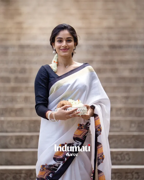 Shweta_Gaj_-_Classic_White_Linen_Saree_with_Elephant_Motif_Border_&_Blouse_Piece