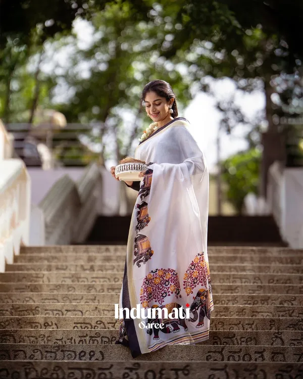 Shweta_Gaj_-_Classic_White_Linen_Saree_with_Elephant_Motif_Border_&_Blouse_Piece