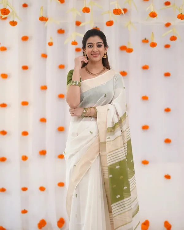 White_Color_Recent_Release_Soft_Banarasi_Silk_Saree_with_Classy_Green_Color_Blouse_Piece