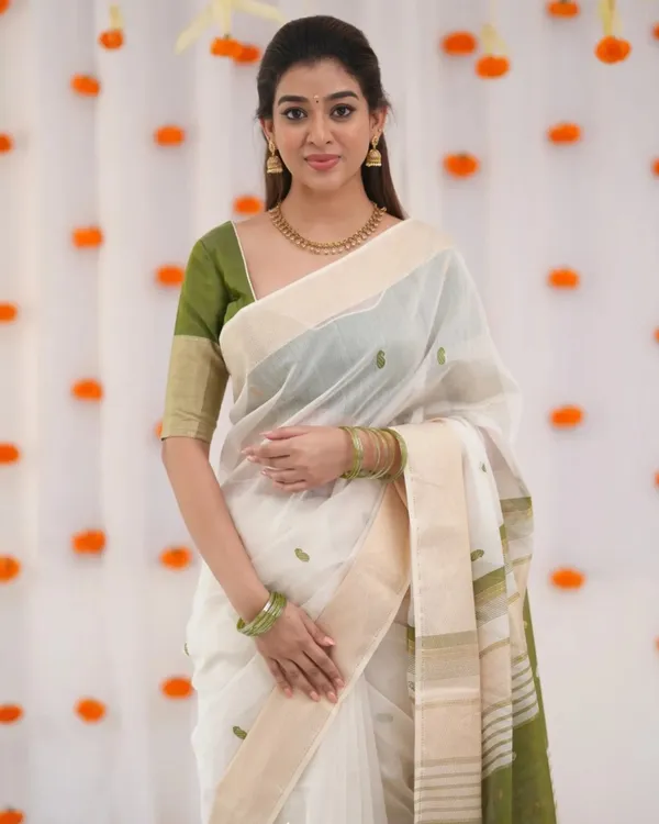 White_Color_Recent_Release_Soft_Banarasi_Silk_Saree_with_Classy_Green_Color_Blouse_Piece