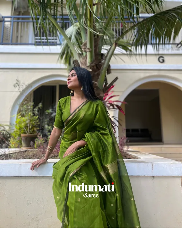 Green_Premium_Cotton_Silk_Saree_With_Classy_Blouse_and_tassels