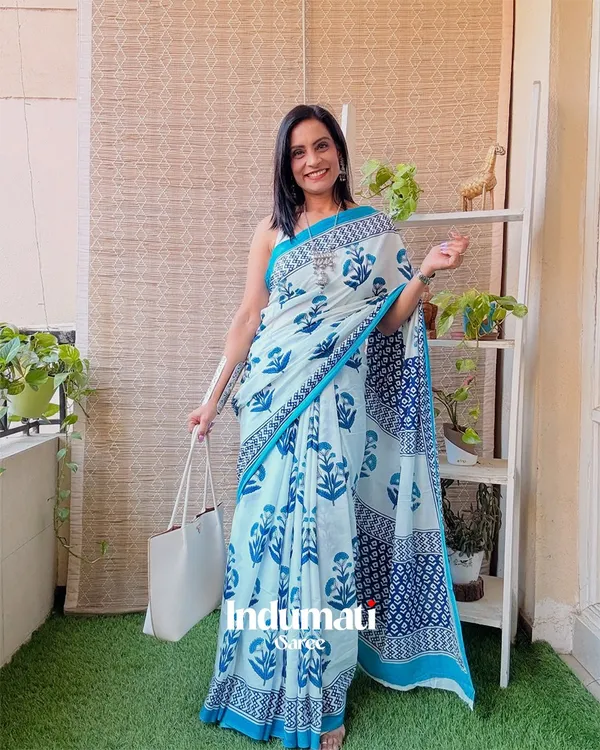 Neelpari_-_White_Linen_Saree_with_Blue_Flower_Work_&_Blouse