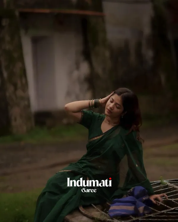 Green__Premium_Cotton_Silk_Saree_With_Classy_Blouse_and_tassels