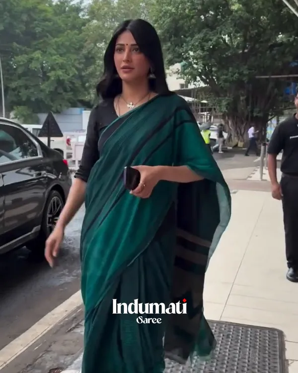 Vrinda_Ratri_-_Kajal_Aggarwal_in_Graceful_Green_Linen_Saree_with_Black_Detailing_&_Blouse_Piece
