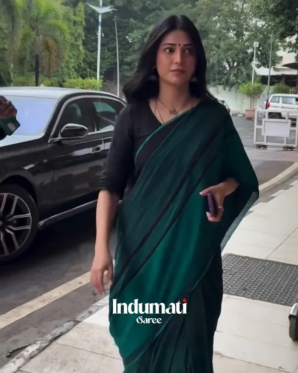 Vrinda_Ratri_-_Kajal_Aggarwal_in_Graceful_Green_Linen_Saree_with_Black_Detailing_&_Blouse_Piece