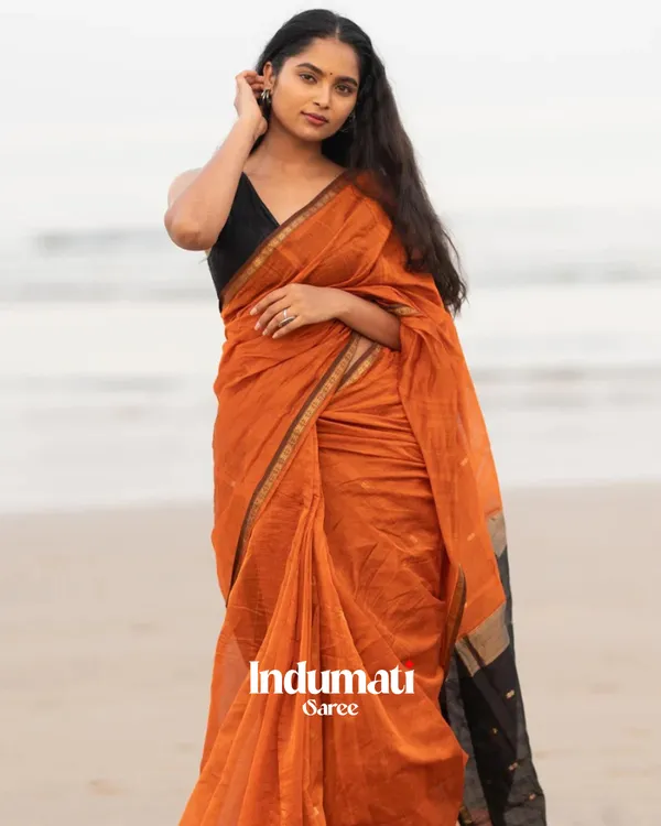Orange_Premium_Cotton_Silk_Saree_With_Classy_Blouse_and_tassels