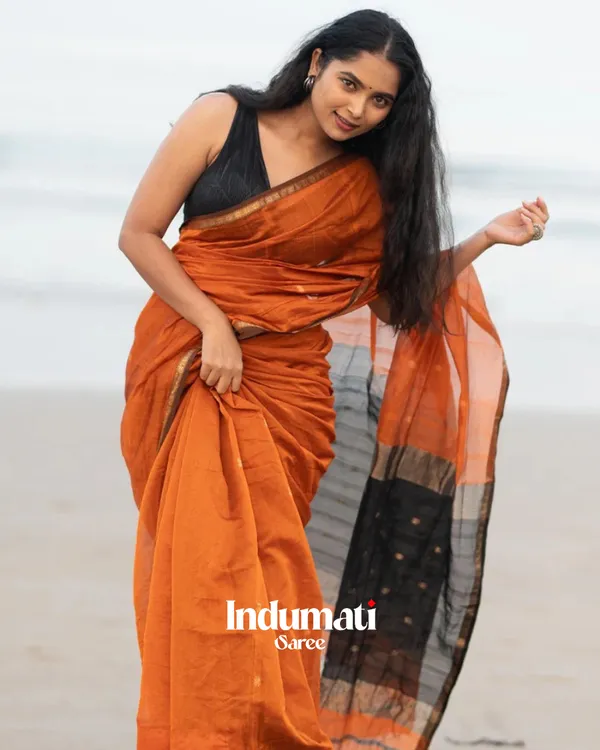 Orange_Premium_Cotton_Silk_Saree_With_Classy_Blouse_and_tassels