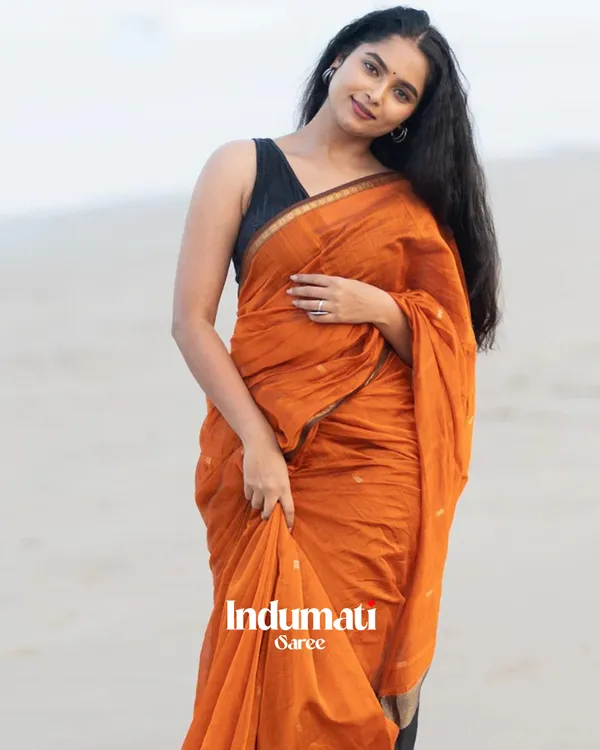 Orange_Premium_Cotton_Silk_Saree_With_Classy_Blouse_and_tassels
