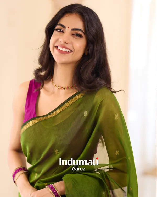 Green_Premium_Cotton_Silk_Saree_With_Classy_Blouse_and_tassels