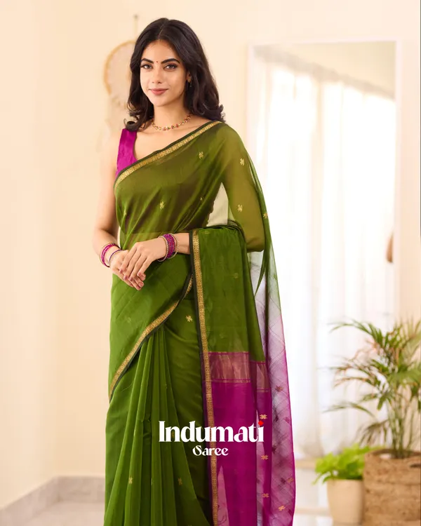 Green_Premium_Cotton_Silk_Saree_With_Classy_Blouse_and_tassels