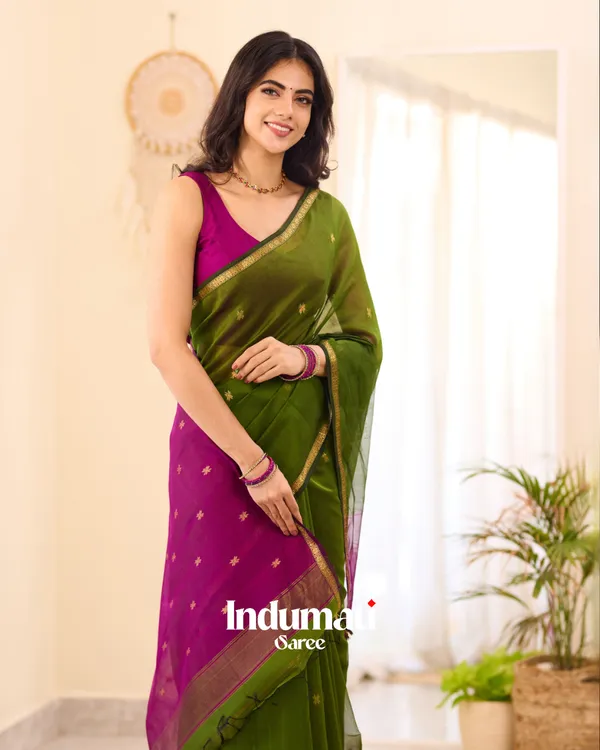 Green_Premium_Cotton_Silk_Saree_With_Classy_Blouse_and_tassels