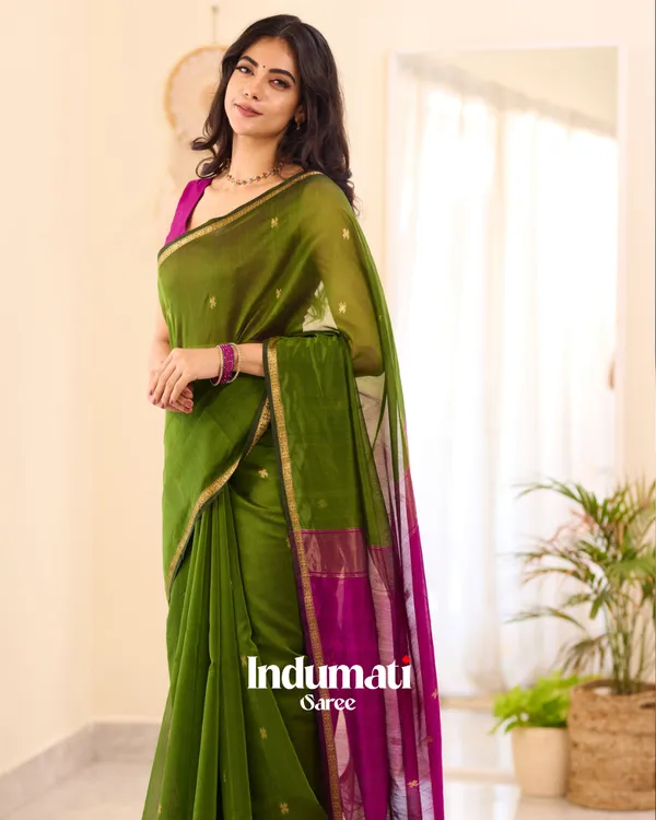 Green_Premium_Cotton_Silk_Saree_With_Classy_Blouse_and_tassels