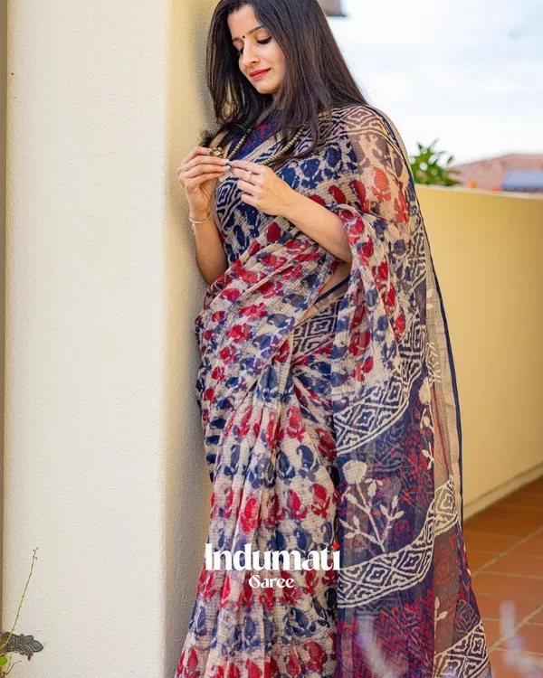 Neel_Aruna_-_Navy_Blue_&_Rust_Linen_Saree_with_All_Over_Design_&_Blouse_Piece