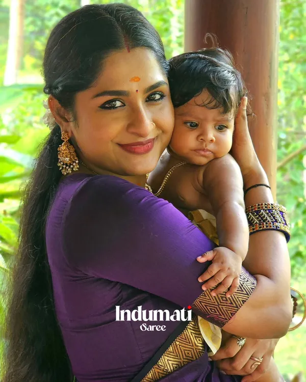 Purple_Premium_Cotton_Silk_Saree_With_Classy_Blouse_and_tassels