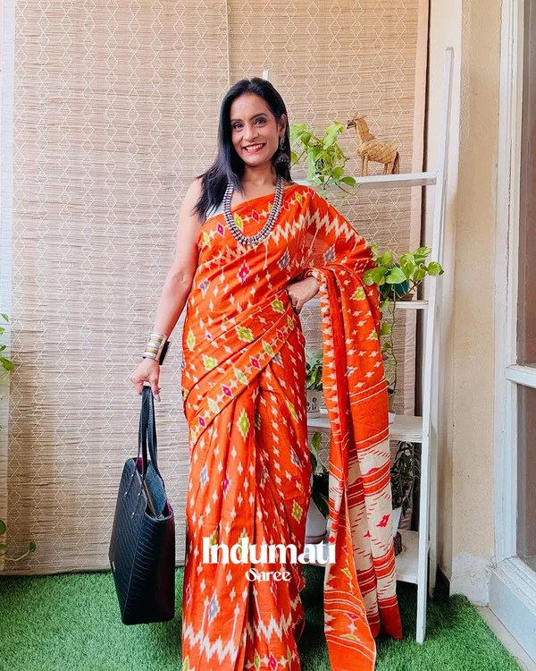 Kesari_Craft_-_Saffron_Linen_Saree_with_Unique_Prints_&_White_Blouse