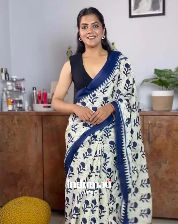 Safed_Neel_-_White_Linen_Drape_with_Blue_Border_and_Black_Blouse_Fabric