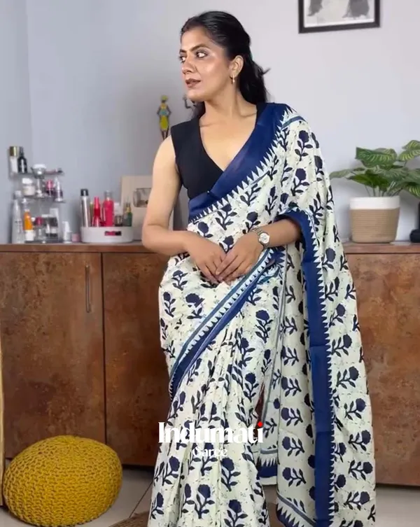Safed_Neel_-_White_Linen_Drape_with_Blue_Border_and_Black_Blouse_Fabric