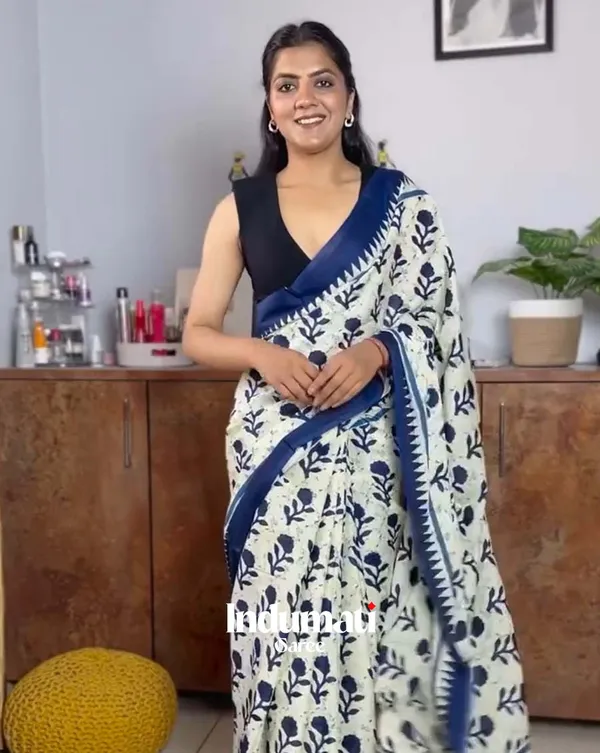 Safed_Neel_-_White_Linen_Drape_with_Blue_Border_and_Black_Blouse_Fabric