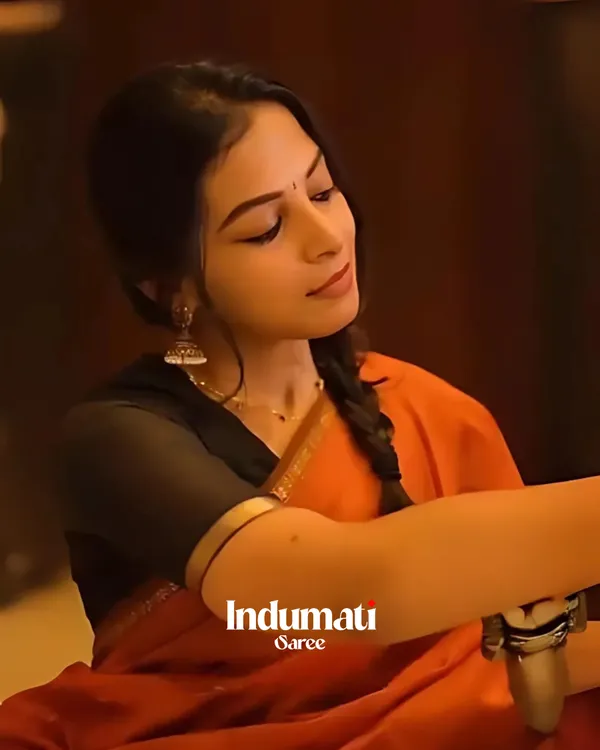 Orange_Premium_Cotton_Silk_Saree_With_Classy_Blouse_and_tassels