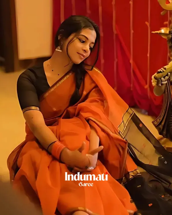 Orange_Premium_Cotton_Silk_Saree_With_Classy_Blouse_and_tassels