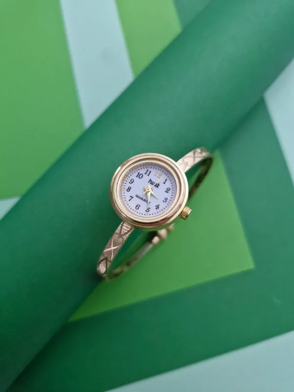 Regal_Minimalist_Cross-Etched_Gold-Plated_Bangle_Watch