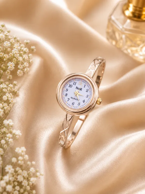 Regal_Minimalist_Cross-Etched_Gold-Plated_Bangle_Watch