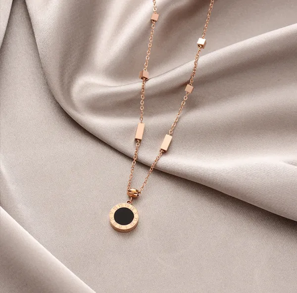 Rose_Gold_Roman_Alphabet_Black_And_White_Double-Sided_Round_Titanium_Steel_Cubic_Zirconia_rose_Gold-plated_Plated_Alloy,_Stainless_Steel