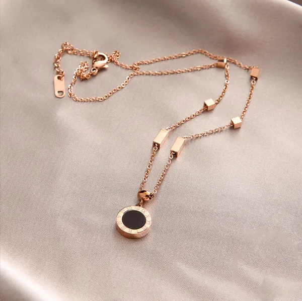 Rose_Gold_Roman_Alphabet_Black_And_White_Double-Sided_Round_Titanium_Steel_Cubic_Zirconia_rose_Gold-plated_Plated_Alloy,_Stainless_Steel