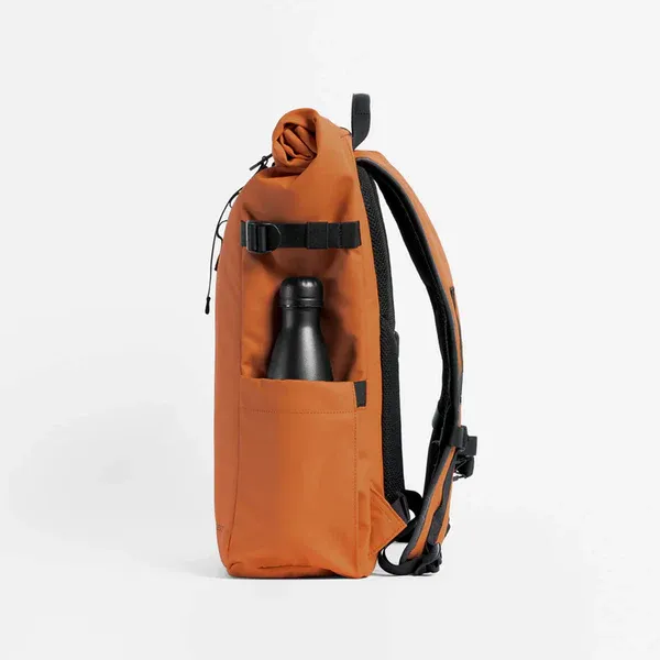 Nomad_Luxe_Rolltop_Sleek_Waterproof_Backpack_For_16.5L_Laptops_+_Luggage_Strap_Stale_Orange_For_Unisex_(Pack_Of_2)