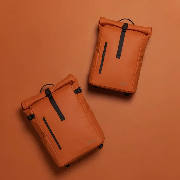 Sleek_16.5L_Waterproof_Backpack_For_Laptops_+_Luggage_Strap_Stale_Orange_For_Unisex