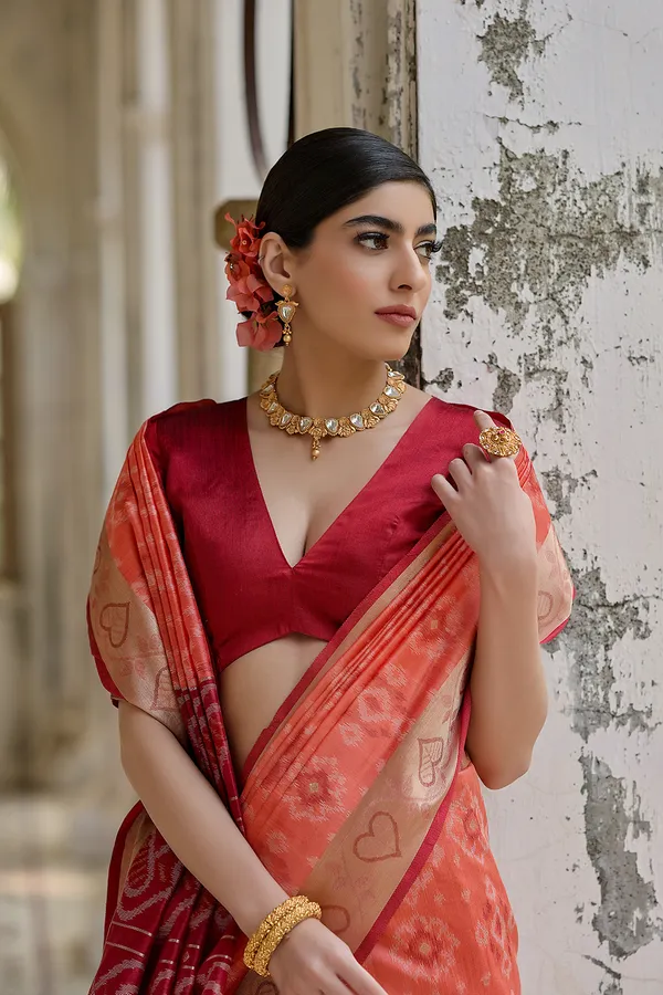 Orange_Raw_Silk_Saree_With_Blouse_Piece_For_Women